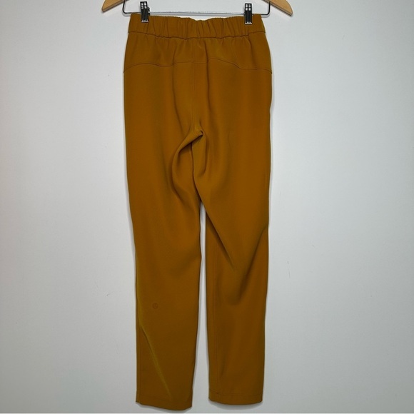 Lululemon On the Fly 7/8 Pant *Woven in Fools Gold Size 2 - Picture 7 of 12
